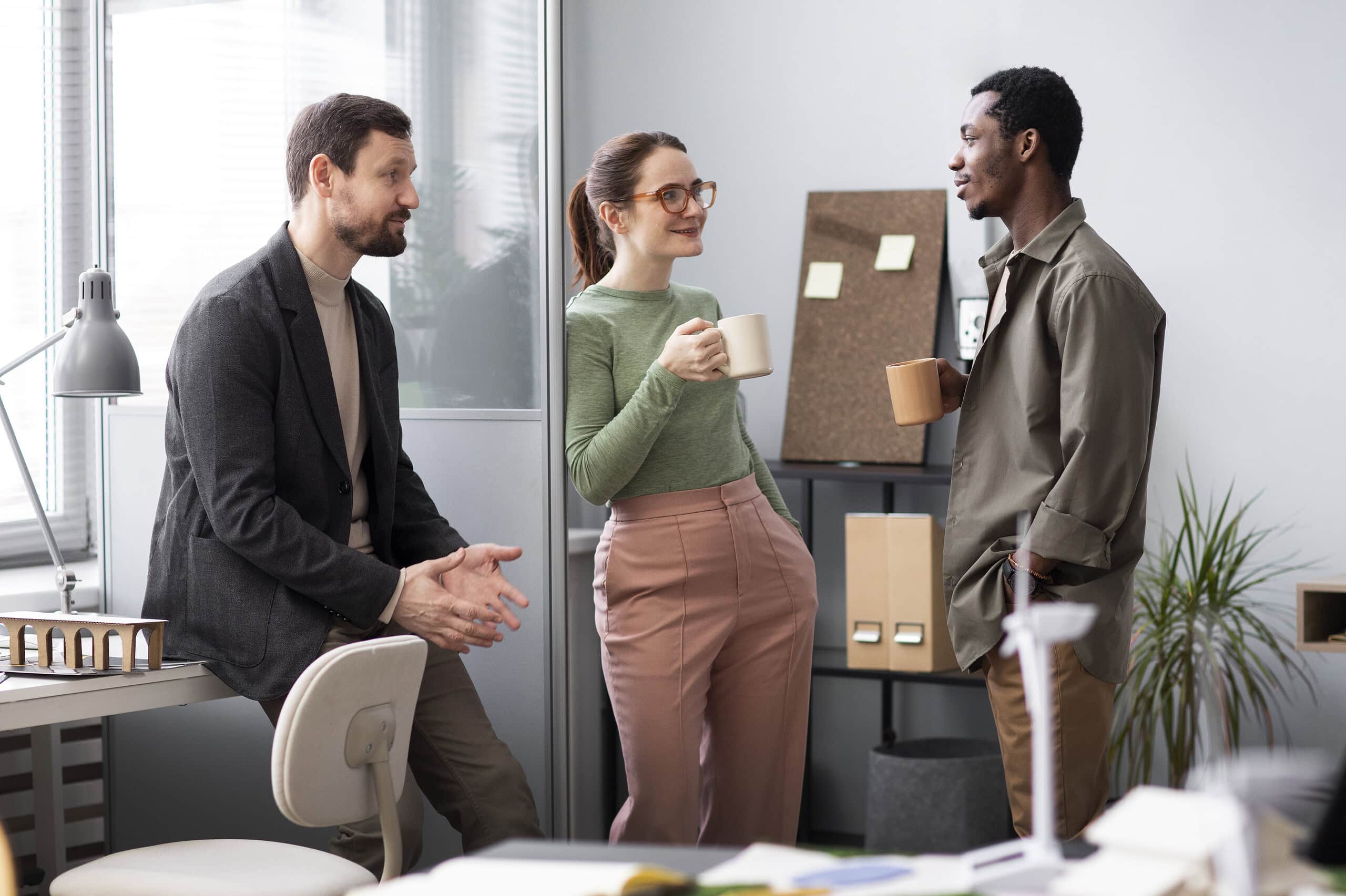 Business team discussing in modern office for international recruitment.